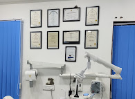 Wall of dental certifications and diplomas